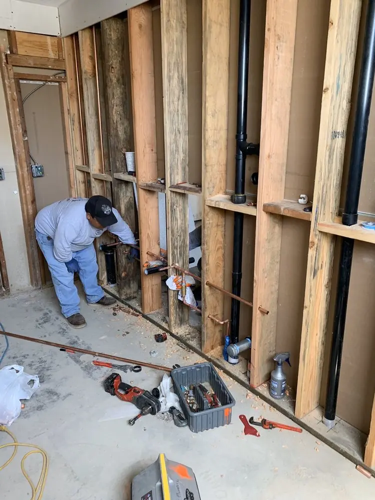 Commercial rough-in plumbing for Water Heater Replacement in Thomas Street